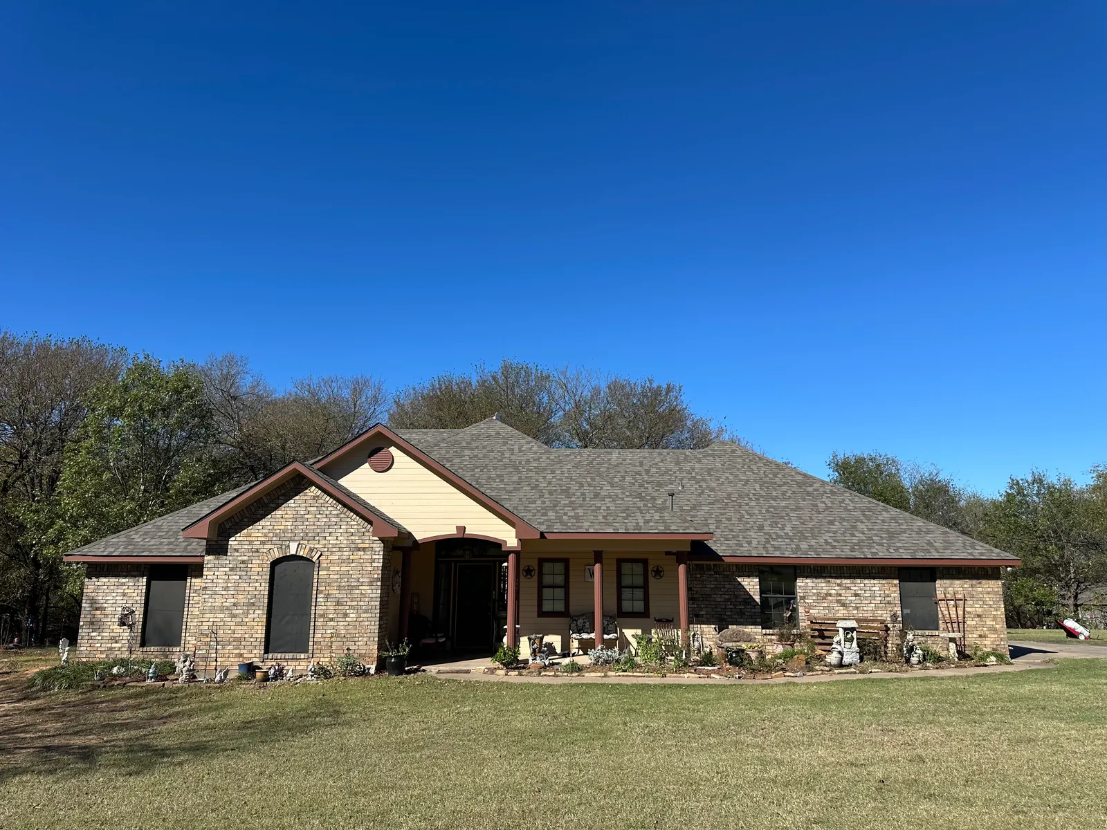 Front elevation showing the completed Driftwood reroof in Denison, TX.