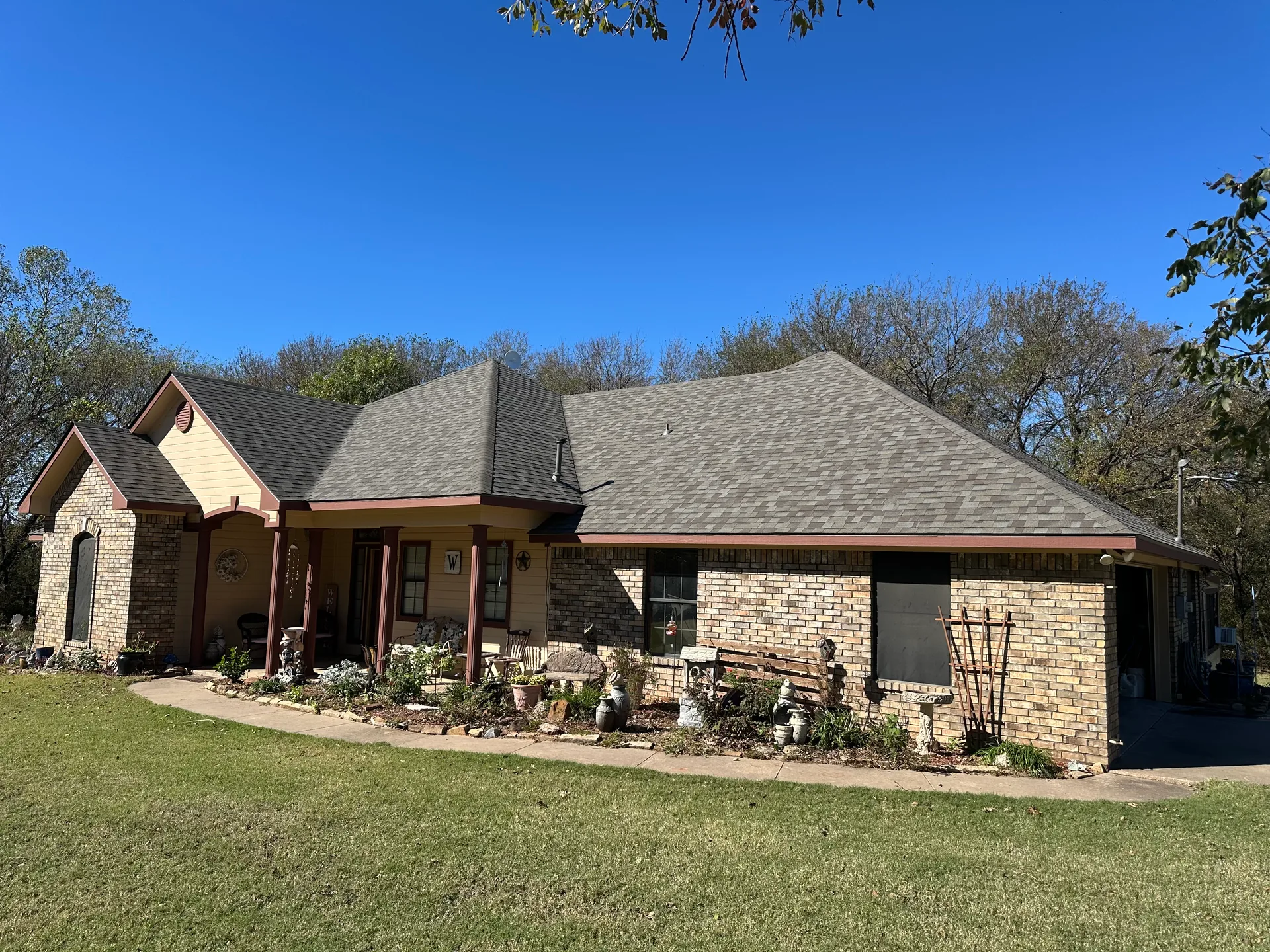 Completed Driftwood shingle roof on the Denison home documented as a Class 3 reroof in November 2025.
