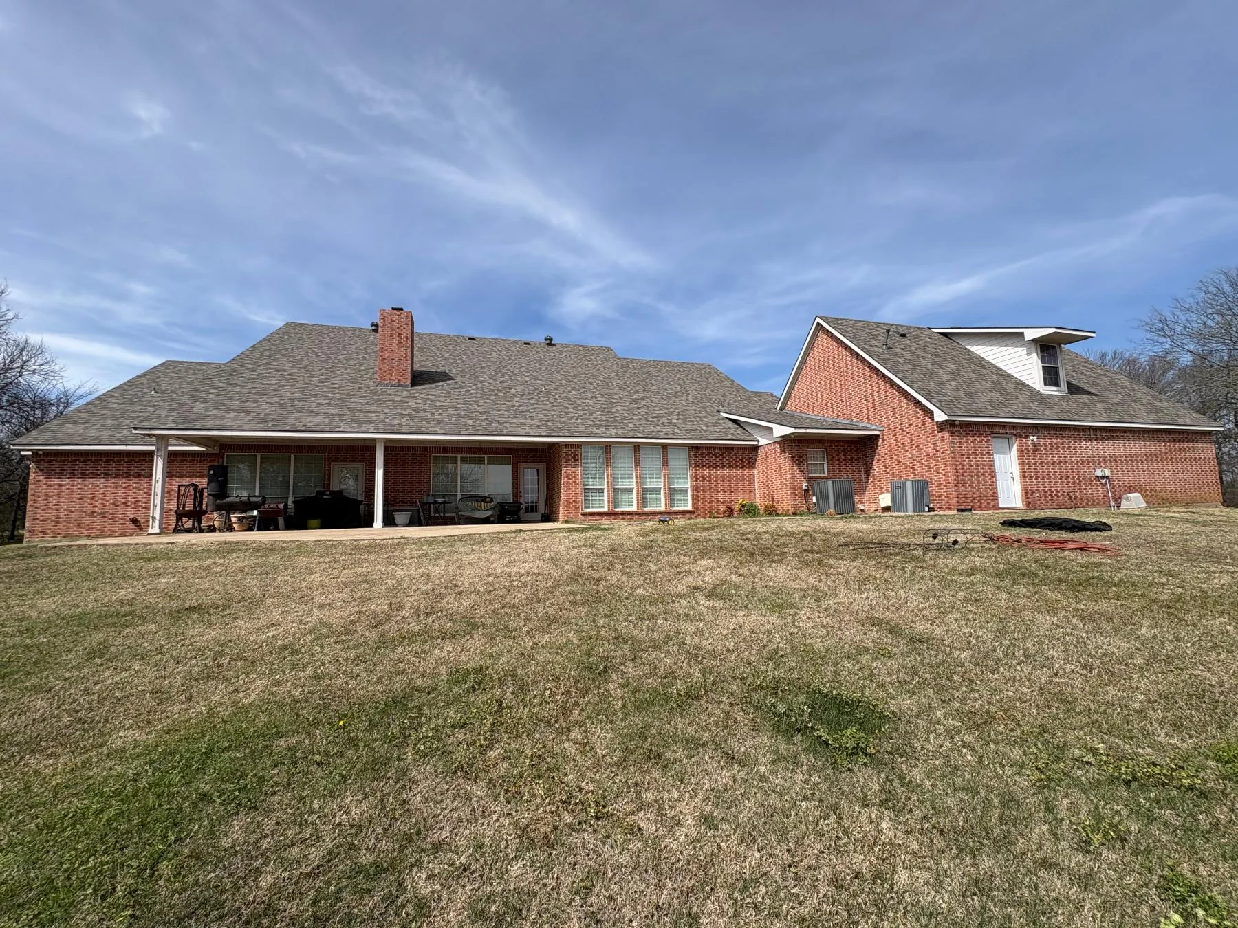 Completed Driftwood shingle roof viewed from the rear in Denison Texas