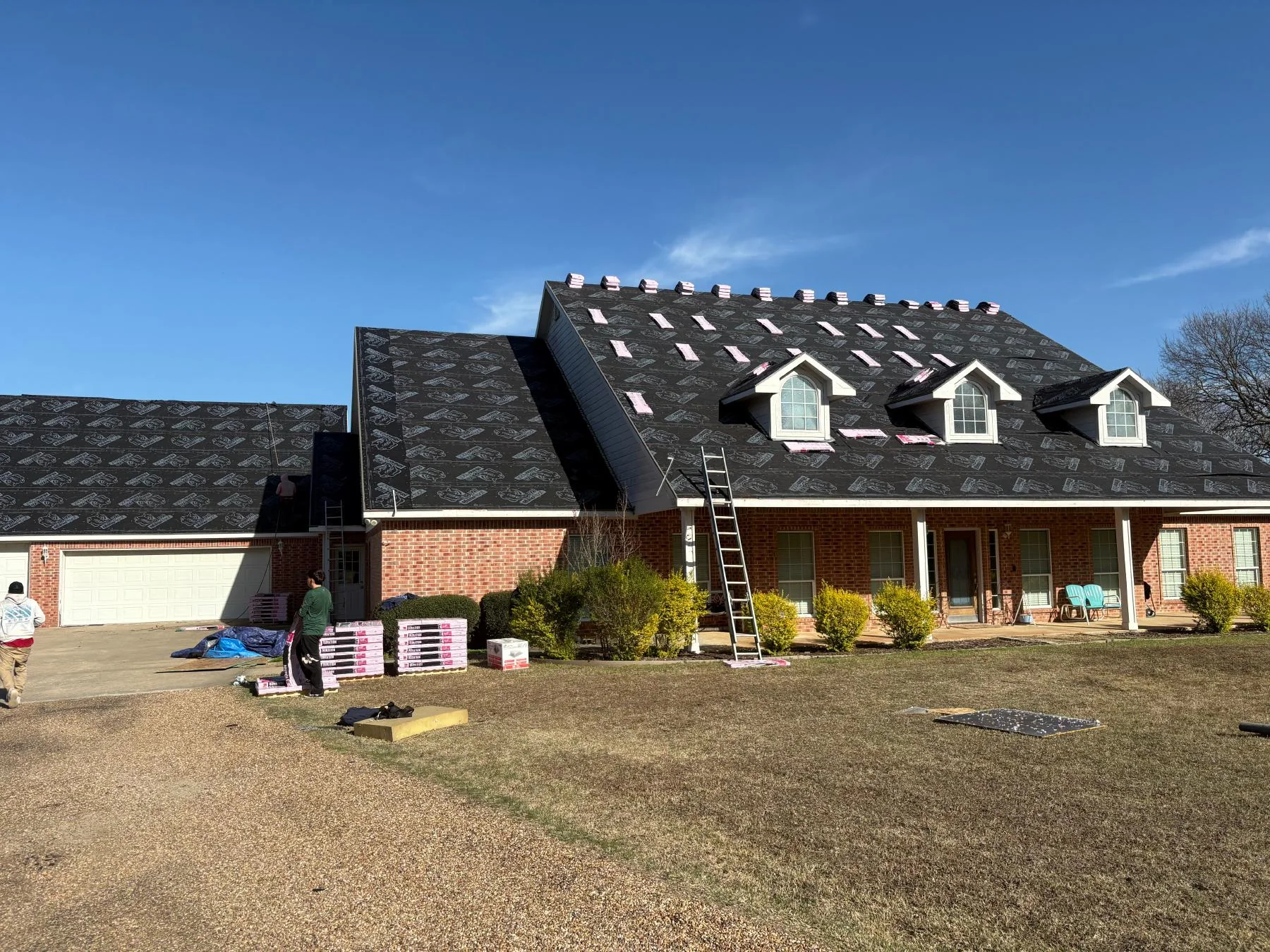 Owens Corning shingle installation in progress in Denison Texas