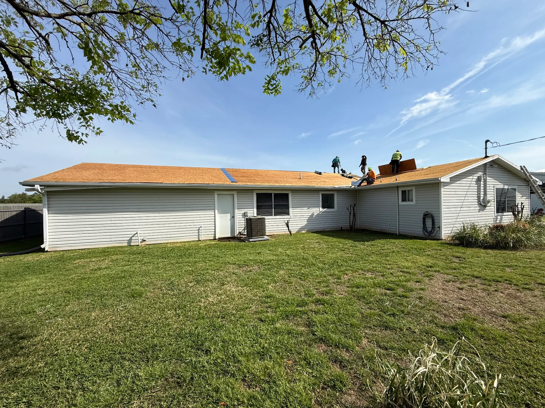 New roof decking installed after structural repairs on a Pottsboro Texas home