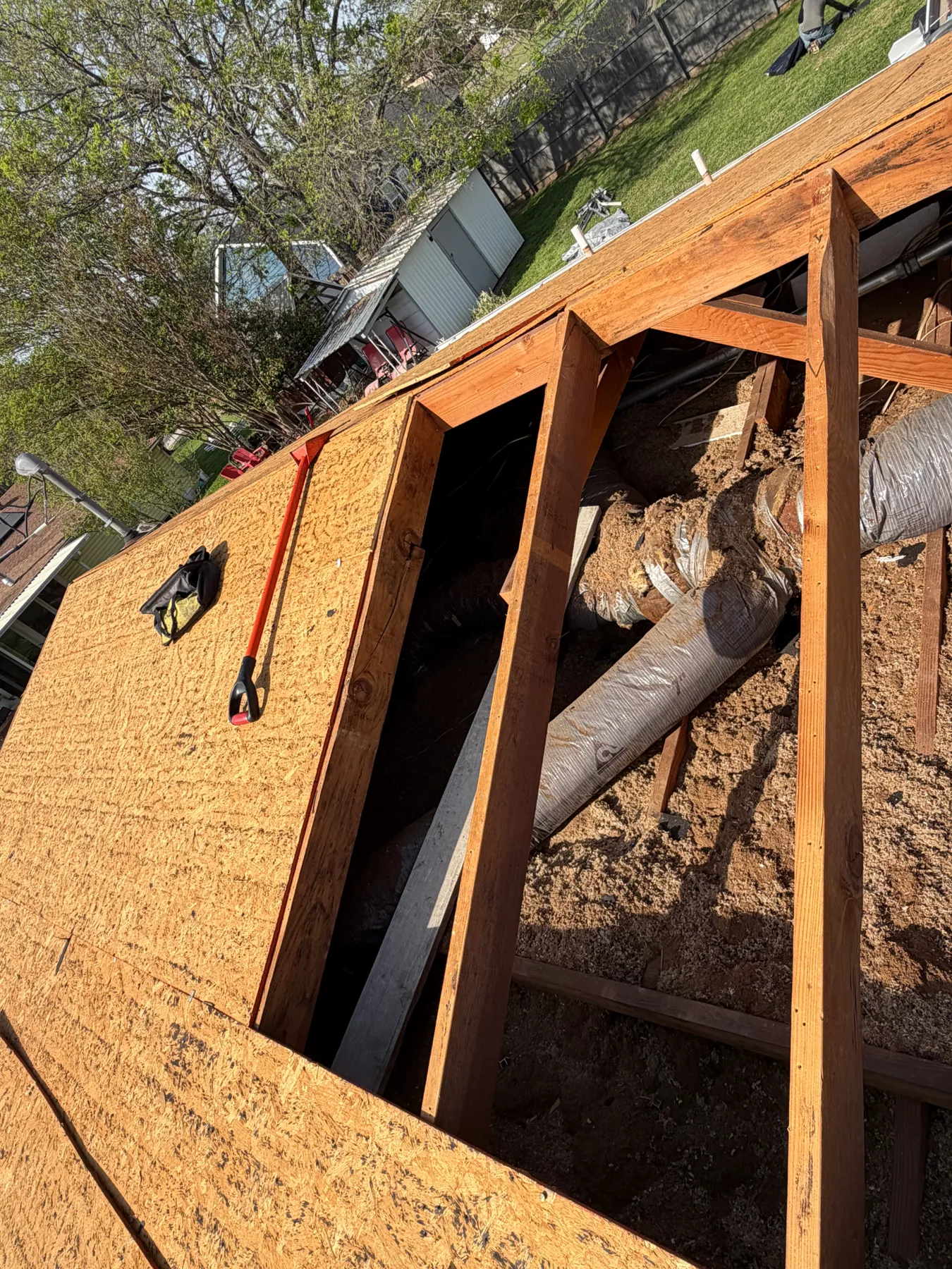 Roof framing exposed for rafter and decking repair in Pottsboro Texas
