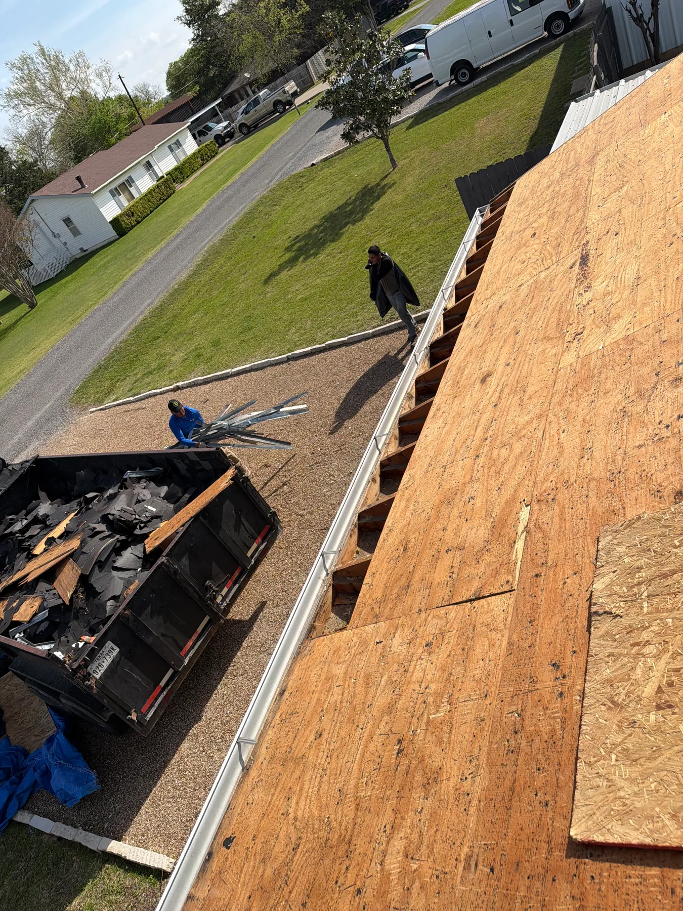 Roof decking replacement in progress during a Pottsboro Texas reroof