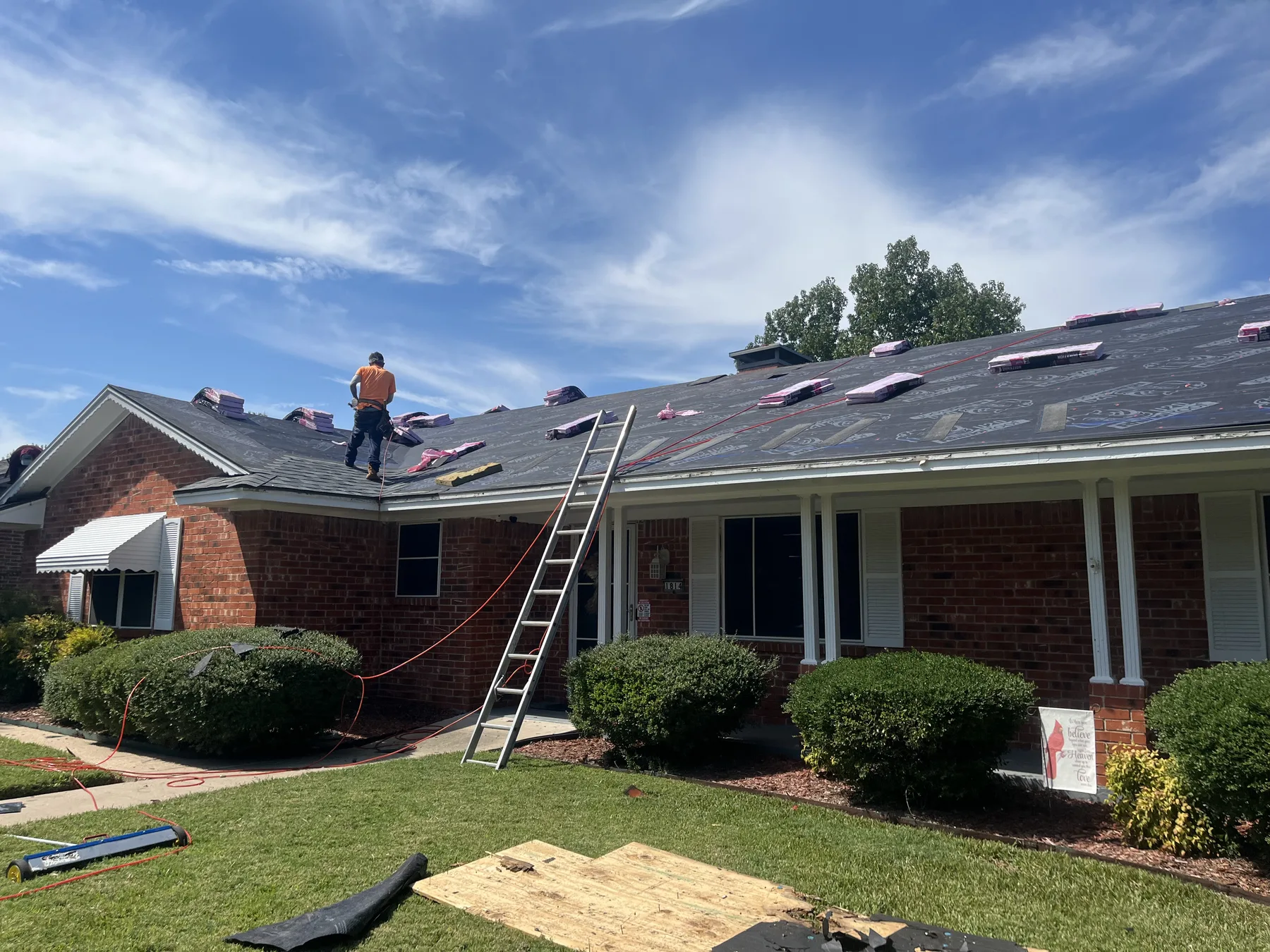 Owens Corning Estate Gray shingle installation in progress in Sherman Texas